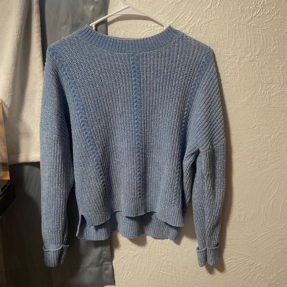 I am still selling a blue knitted sweater. It is very soft. It is a size medium. - Picture 1 of 3